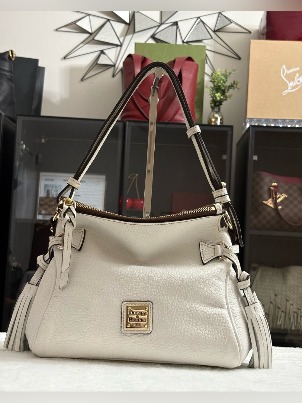 Dooney & Bourke Pebble Grain Tassel Shoulder Bag White.